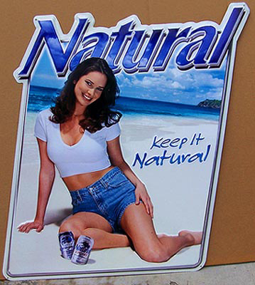 Natural Beer Girl on Beach Tin Sign